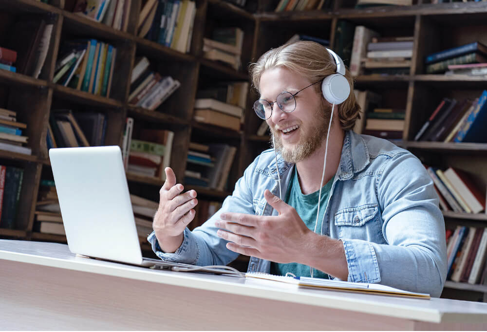 man learning on laptop